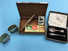 Silver cigarette box, napkin rings etc.