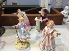 Four Royal Doulton figures