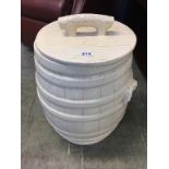 A glazed pickle barrel and lid