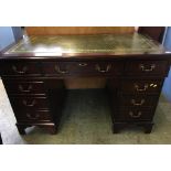 Mahogany pedestal desk with leather inset top