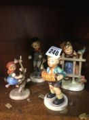 Four Hummel figures