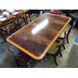 Reproduction walnut dining table and six random 19th century dining chairs