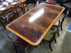 Reproduction walnut dining table and six random 19th century dining chairs