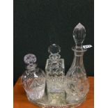 Three decanters and a tray