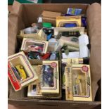 One box of die cast vehicles