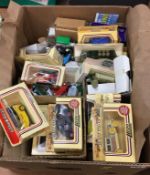 One box of die cast vehicles