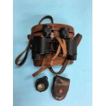 Pair of military issue binoculars and a compass