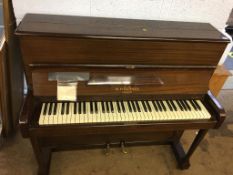 A short upright piano by W.H. Barnes of London