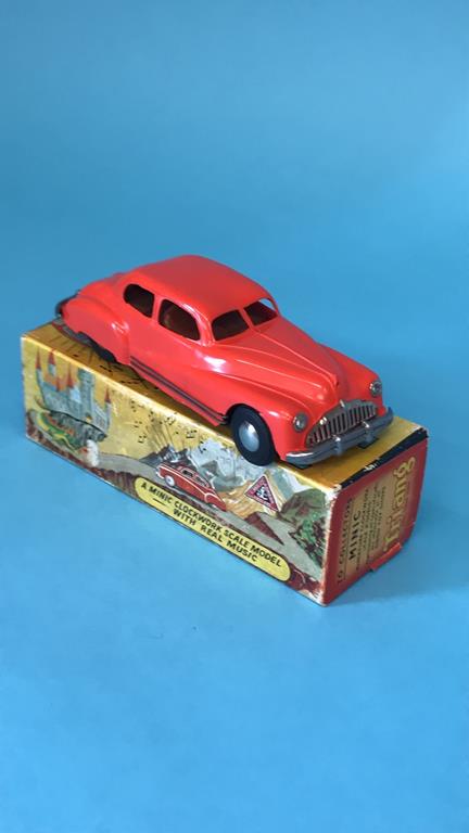 A boxed Tri-Ang No2 Minic musical car