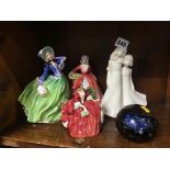 Four various figures, Royal Doulton etc., and a paperweight