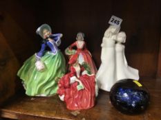 Four various figures, Royal Doulton etc., and a paperweight