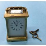 Four glass brass carriage clock