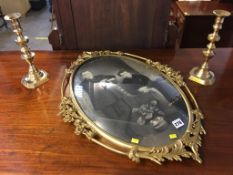 Brass picture frame and pair of candlesticks