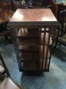 A mahogany revolving bookcase