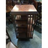 A mahogany revolving bookcase