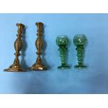 Pair of hock glasses and a pair of candlesticks