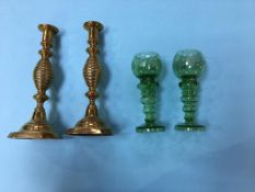 Pair of hock glasses and a pair of candlesticks