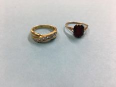 Two rings, one stamped 18k