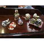 Seven Royal Crown Derby paperweights including Puffin, Misty, Puppy etc., a small Toby jug and a