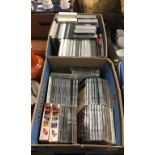Two boxes of CDs and DVDs