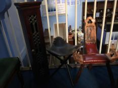 Stool, narrow cabinet and a three legged chair