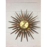 A Seth Thomas Sunburst clock