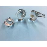 Three glass paperweights