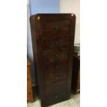 Narrow modern chest of seven drawers