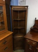 Oak standing corner cabinet