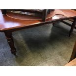 Mahogany extending dining table, with extra leaf