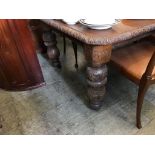 A Victorian carved oak dining table, with two leaves, 235cm length, 120cm wide