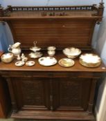 A Continental carved oak sideboard, with concave raised back