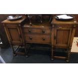 An oak barley twist sideboard