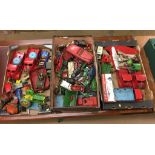 Three boxes of die-cast and tin plate toys