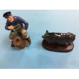 A Royal Doulton figure 'The Lobster Man' and a pig