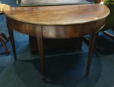 A 19th century mahogany half moon hall table
