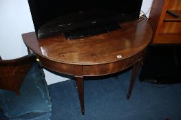 A 19th century mahogany demi lune hall table