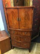 Reproduction mahogany bowfront cocktail cabinet