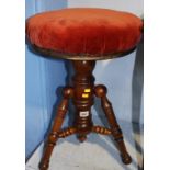 A mahogany circular stool