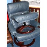 A blue leather Thomas Lloyd swivel chair and stool