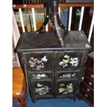 Oriental lacquered two door cabinet and an octagonal table