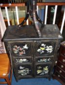 Oriental lacquered two door cabinet and an octagonal table