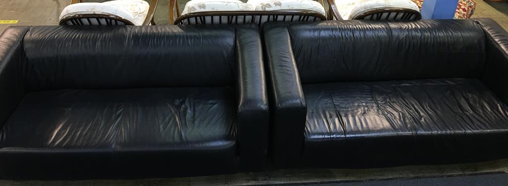 Two black leather settees