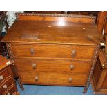 An oak chest of three drawers