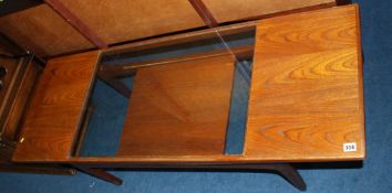 A G Plan teak coffee table, with central glass panel