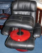 A black leather swivel chair and stool