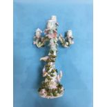 A German porcelain three branch candelabra, number 449, impressed marks, 36cm high