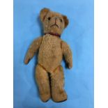 A plush straw filled and jointed teddy bear, 45cm length