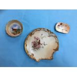 A Royal Worcester plate, with puce marks and two Worcester dishes