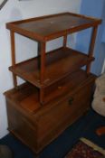 An Oriental style blanket box and tea trolley